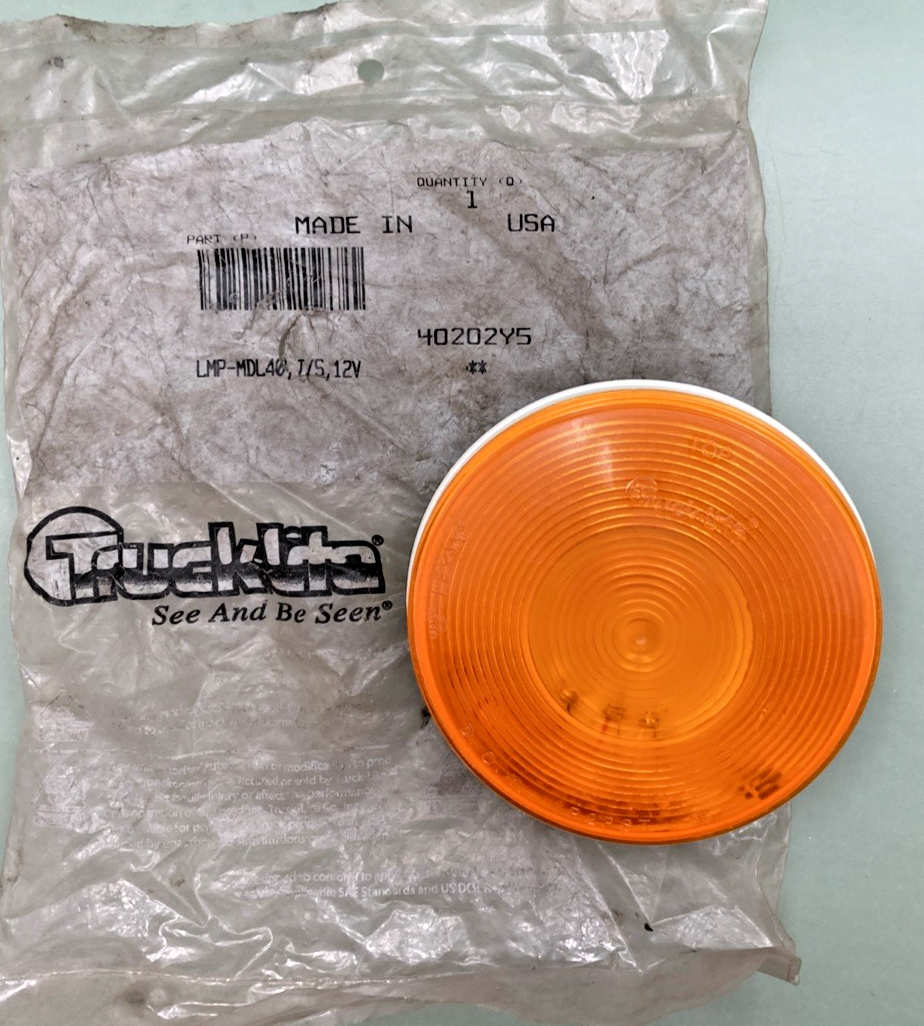 New Genuine Truck-Lite 40202Y5 Amber stop/turn/tail lamp, MDL 40, 12V